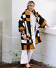black, camel and white quilted checkered jacket with minimalist outfit by Anchal Project