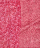 This ecofriendly small quilt features a lovely pink contrasting floral and circle prints 