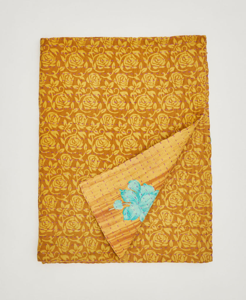Gold floral small throw quilt sustainably crafted using upcycled vintage saris