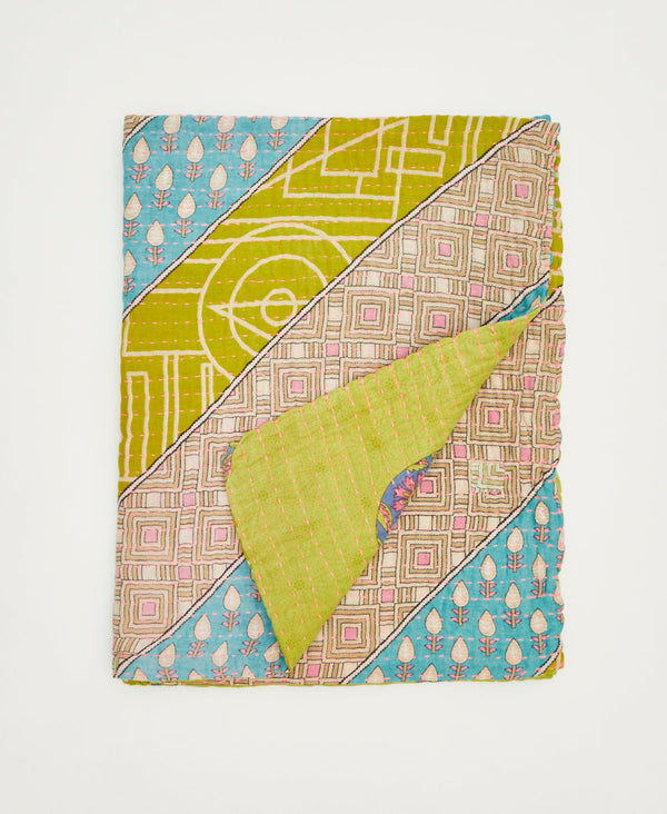 This bright pastel small quilt throw is sustainably crafted using repurposed vintage cotton saris 
