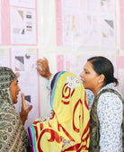 Anchal artisans learning math during education workshop