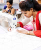 Anchal Project artisan using a donated sewing machine