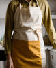 organic cotton bone ivory and mustard yellow modern kitchen apron with adjustable ties