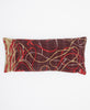 Featuring an abstract swirl pattern, this  handmade pillow is the perfect sustainable decor 