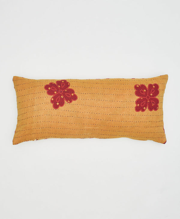 beige sustainable cotton lumbar pillow with large red flowers and black kantha embroidery 