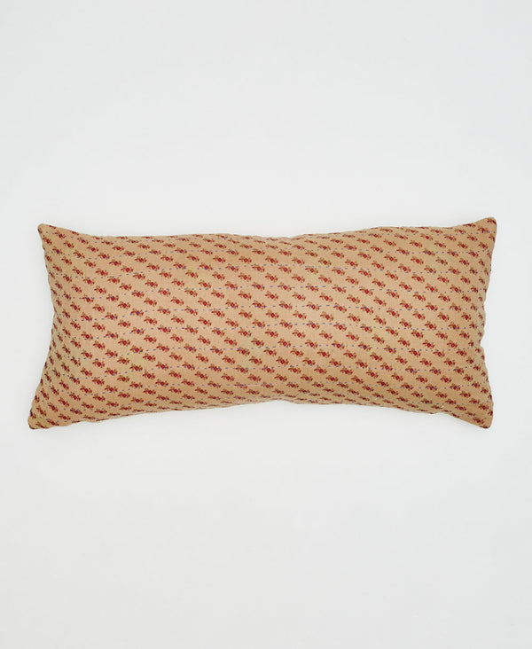beige cotton lumbar pillow with red flowers 