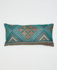 teal sustainable cotton lumbar pillow wiht brown flowers and white geometric details 