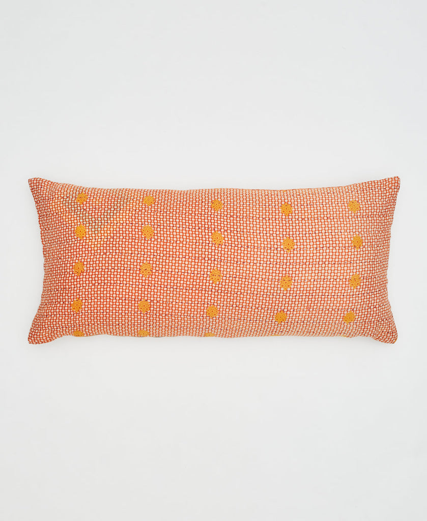orange sustainable cotton lumbar pillow with yellow flowers and kantha stitching 