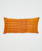 orange cotton lumbar pillow with red crosses and geometric patterns 