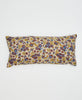 white sustainable lumbar pillow with red, blue, and yellow flowers and white kantha stitching 