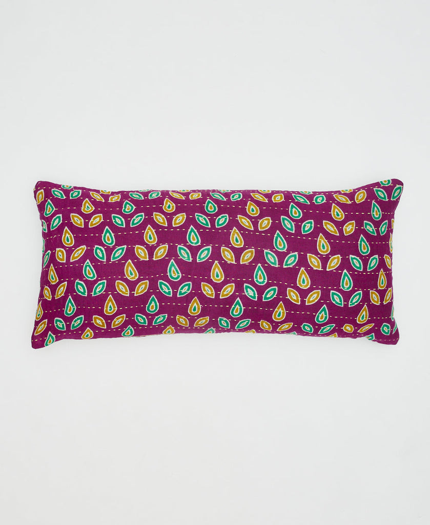 purple sustainable cotton lumbar pillow with teal and green leaves and yellow kantha stitching 
