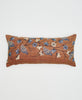 brown cotton lumbar pillow with blue birds and beige flowers and yellow kantha stitching 