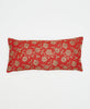red sustainable lumbar pillow with grey flowers