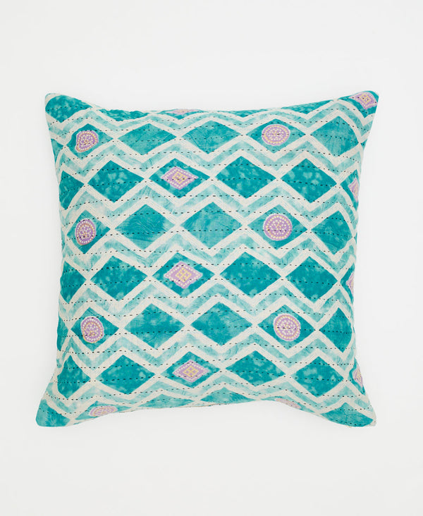 teal and white geometric patterned cotton throw pillow