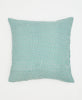 sustainable reversible throw pillow with small teal flowers and traditional kantha stitching 