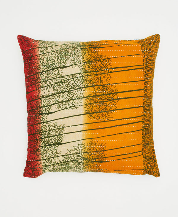 orange, white, and red sustainable throw pillow with green trees and white kantha stitching 