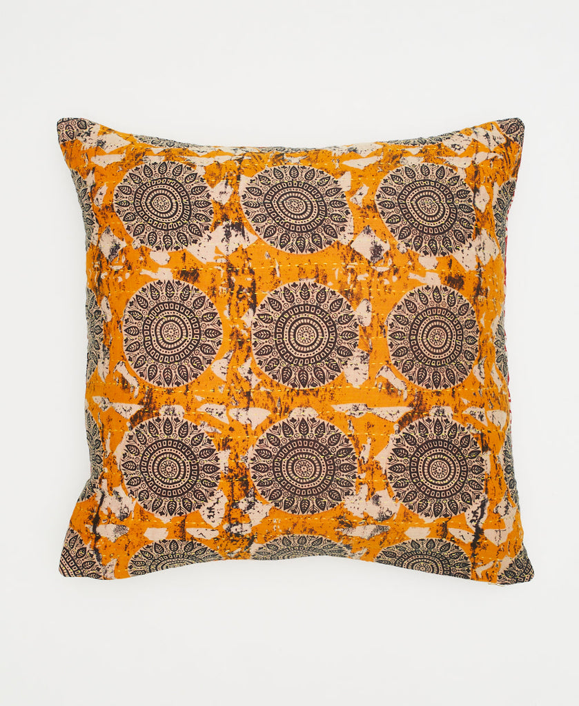 orange vintage kantha throw pillow with black and white medallions and traditional kantha stitching 