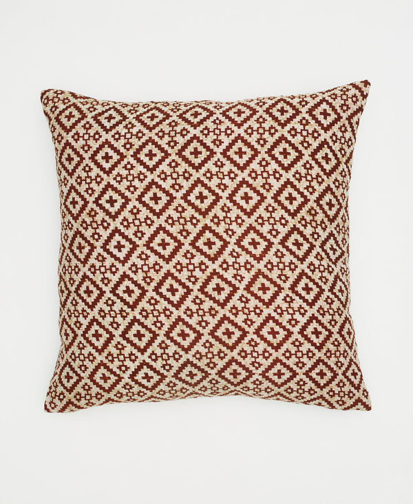 white one-of-a-kind throw pillow with red geometric patterns and kantha stitching 
