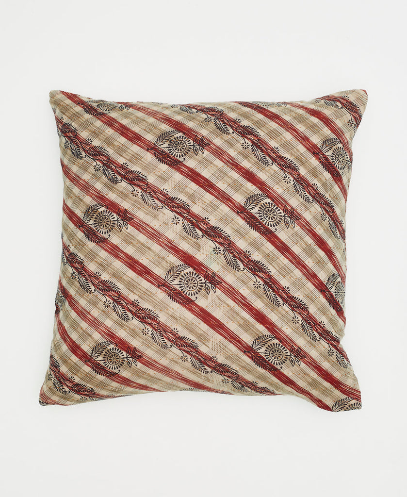 beige cotton throw pillow with red stripes and black flowers 