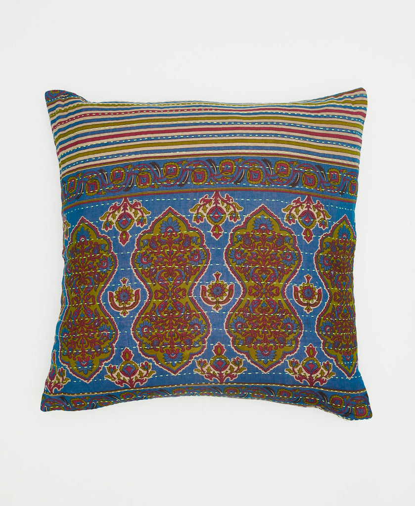 blue cotton throw pillow with green and red stripes and floral patterns
