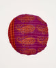 Purple and orange round artisan made throw pillow 