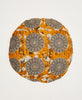 Orange and black patterned round artisan made throw pillow 