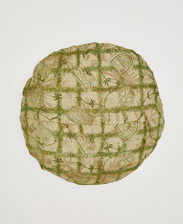 Abstarct brown and green round throw pillow featuring blue traditional kantha hand stitching 