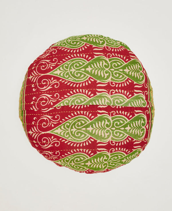 Red, green, and white patterned throw pillow featuring yellow traditional kantha hand stitching 