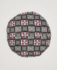 Red. black, grey, and white square print throw pillow featuring pink traditional kantha hand stitching 