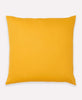 mustard yellow modern throw pillow made from fair trade organic cotton and hand-embroidered