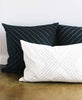 hand-embroidered fair trade white and black throw pillows made from organic cotton