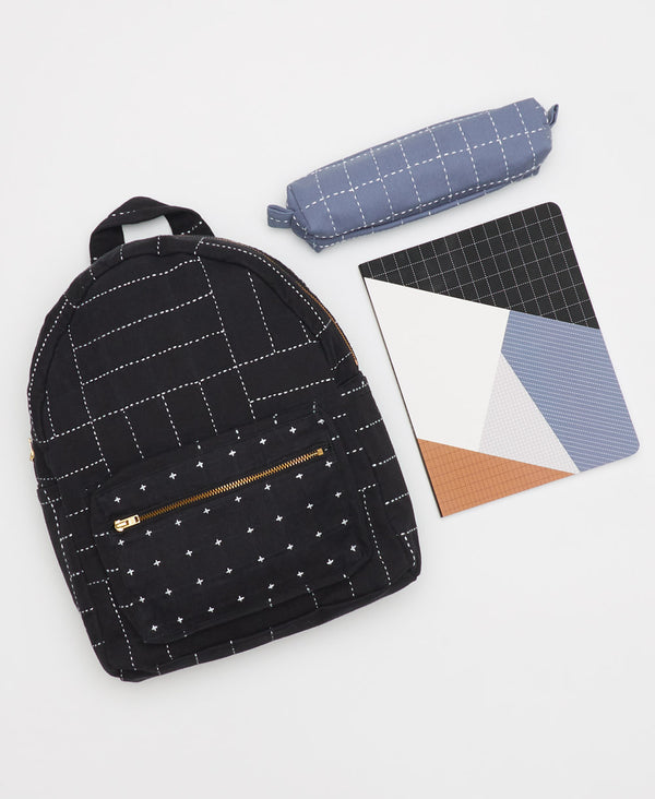 backpack, notebook and pencil case gift set in black and blue tones