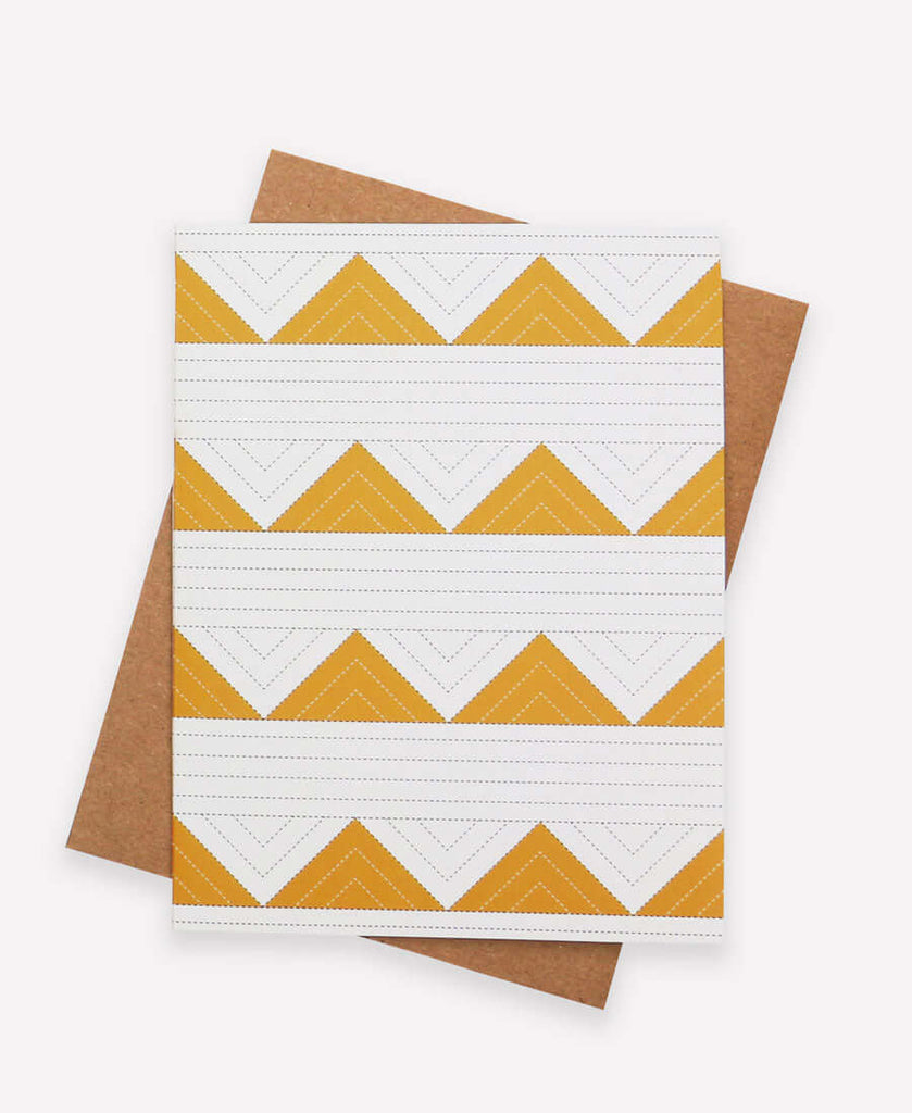 Anchal Project mustard triangle quilt design on blank note card