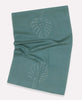 Leaf embroidered kitchen towel featuring white stitching made by Anchal artisans 