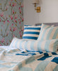ocean blue, cloud blue, and white striped bedding
