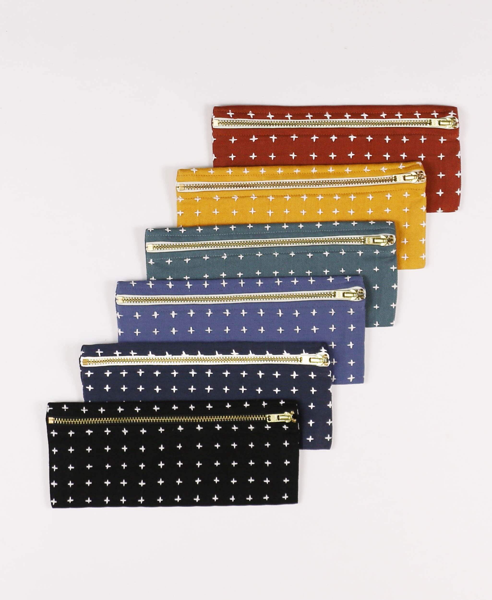 organic cotton pencil pouches in a rainbow of colors