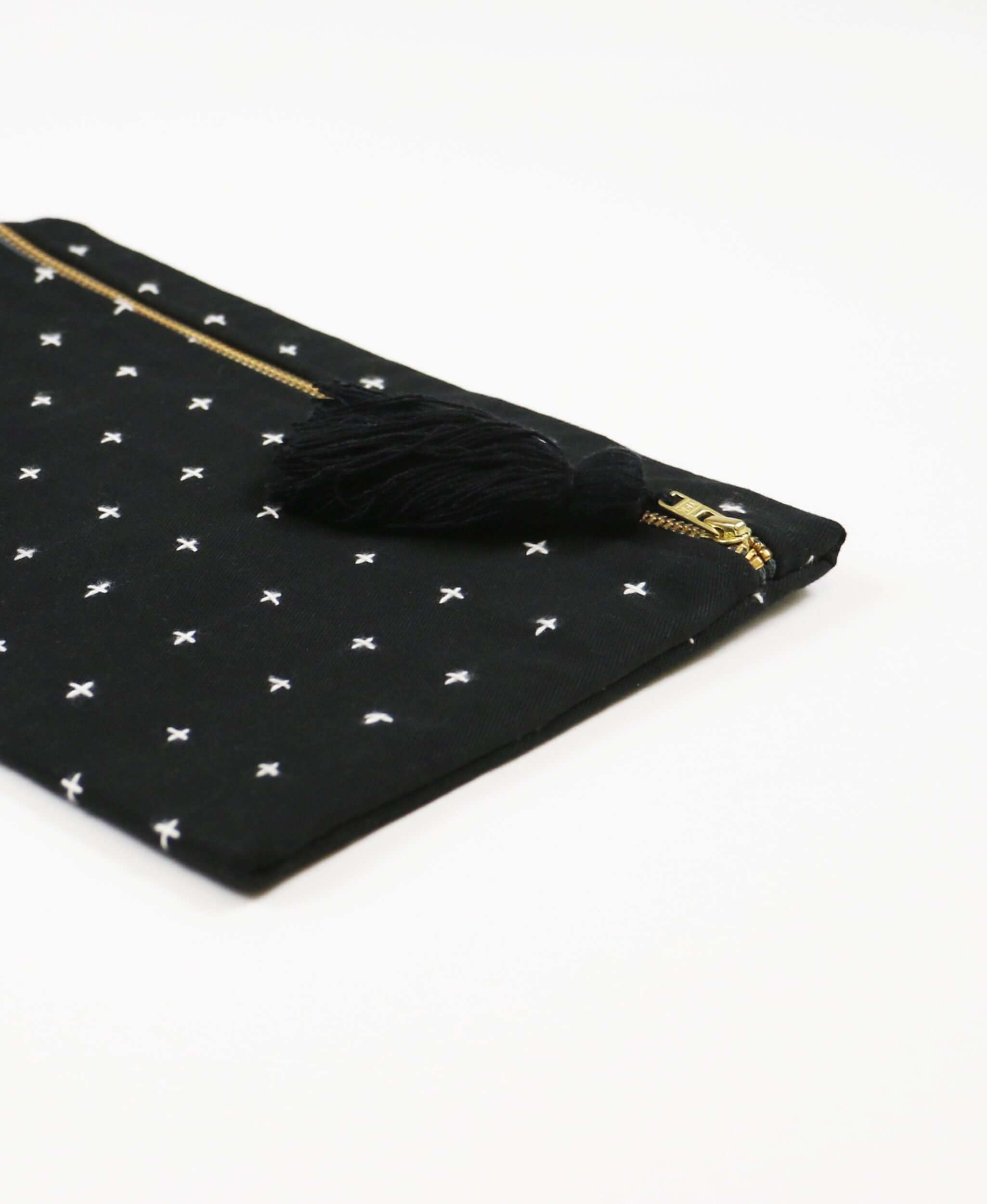 canvas clutch with tassel detail sustainably made by Anchal Project