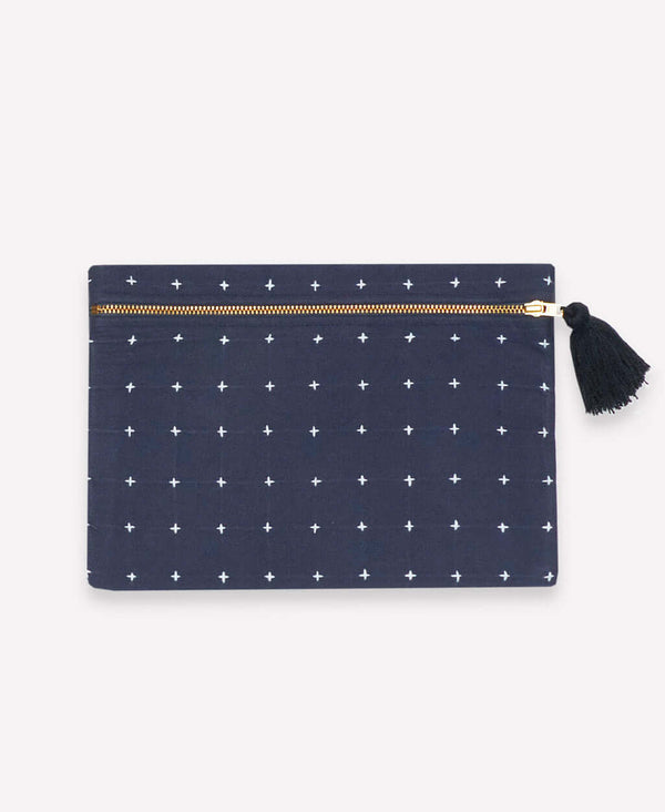 small zippered pouch with embroidery and tassel zipper pull in navy blue