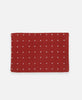 handmade modern clutch with cross-stitch embroidery in rust red