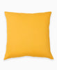 organic cotton cross-stitch throw pillow in mustard yellow by Anchal