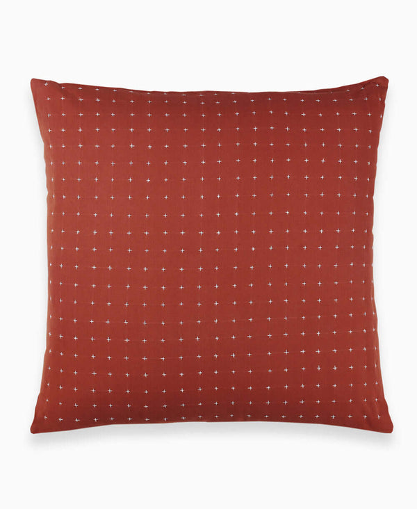 Anchal Project rust colored cross-stitch modern throw pillow