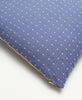 cross-stitch modern throw pillow in blue by Anchal Project