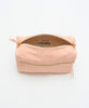 pink zippered toiletry bag with canvas lining hand made by women in India