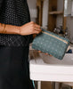 organic cotton toiletry bag in spruce green ethically made by women artisans
