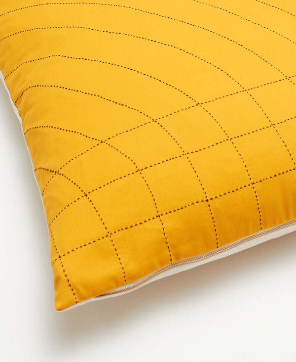 hand-embroidered modern curve throw pillow in mustard yellow