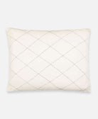 white pillow sham embroidered with diamond pattern and filled with down