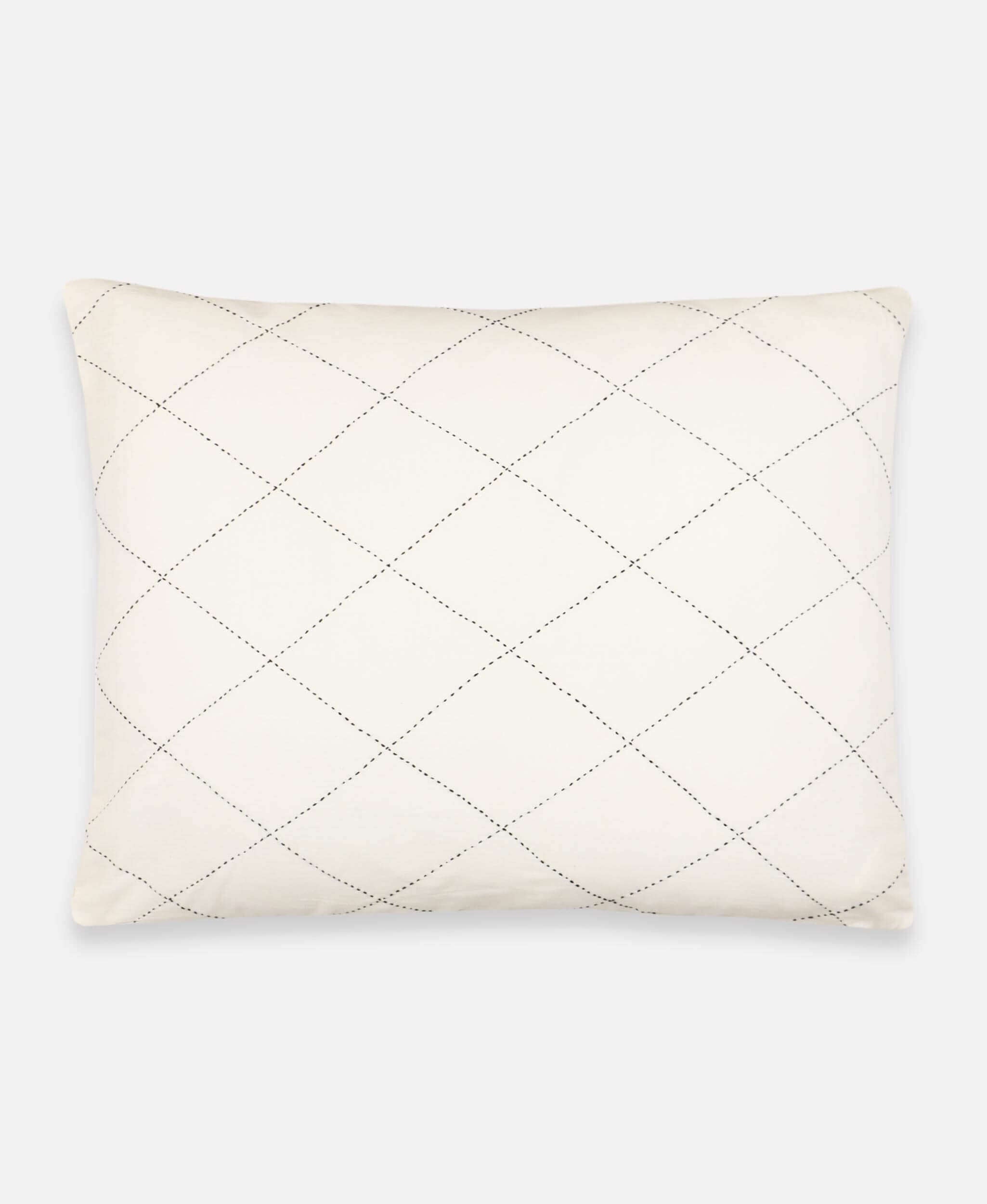 white pillow sham embroidered with diamond pattern and filled with down