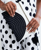 Black and white small clutch featuring traditional Kantha stitching made from Anchal artisans 