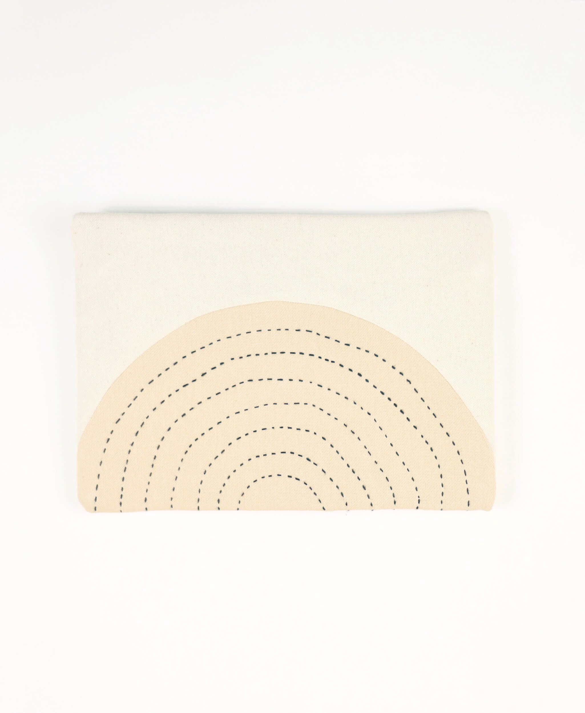 Handmade pouch clutch with tonal concentric appliqué on back