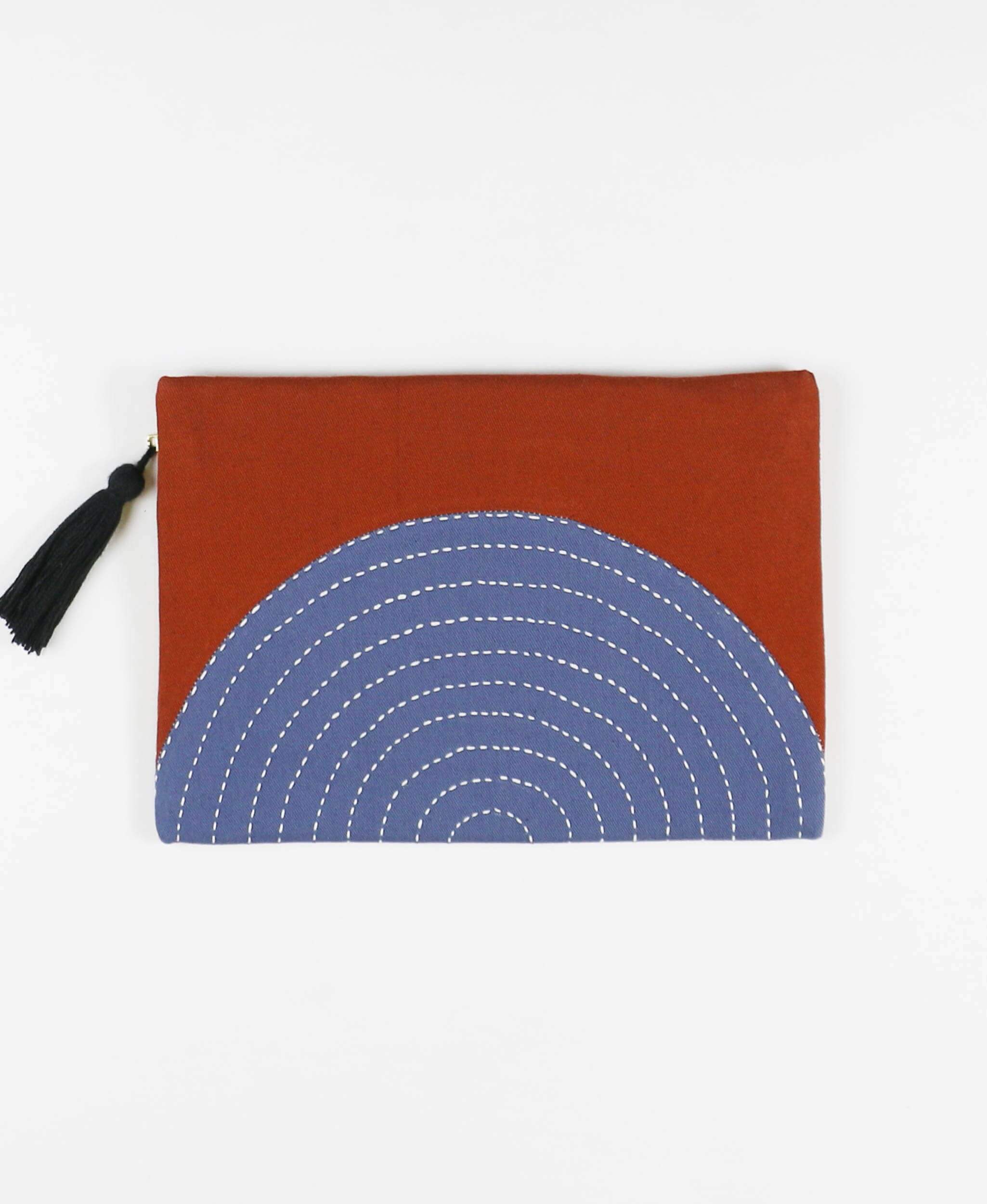 organic cotton rust orange and slate blue clutch with tassel zipper pull